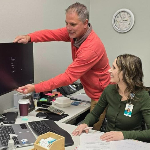 Jared Erie is pictured with staff at Connect Medical while providing an ergonomic assessment.
